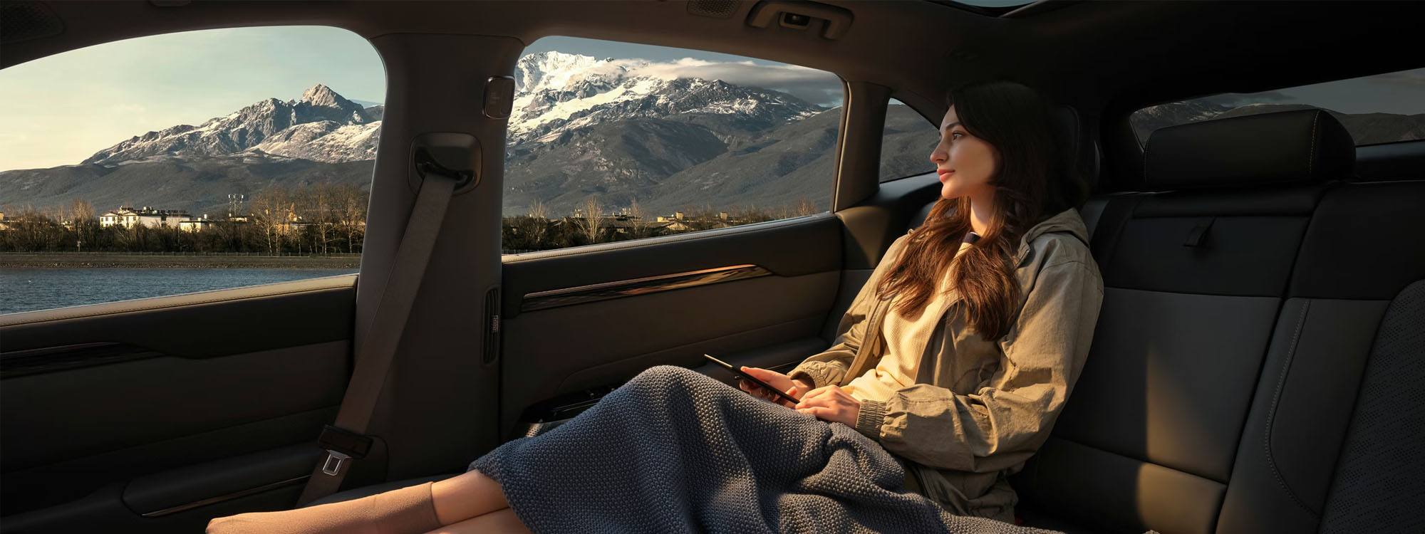 A woman sitting in the rear seats of a Zeekr