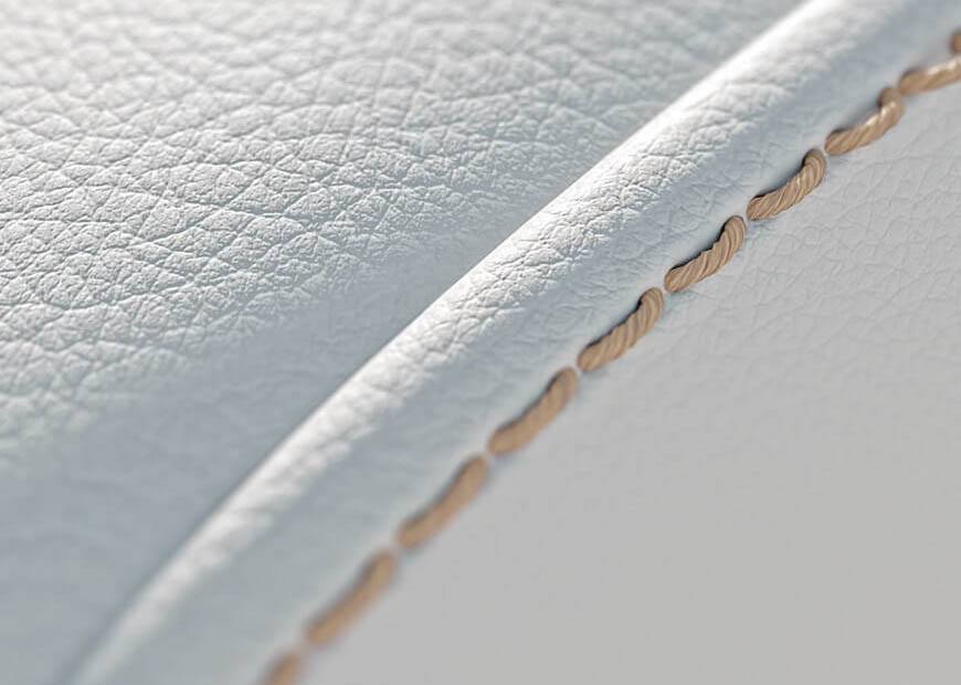 Close-up detail of stitching on white Nappa leather