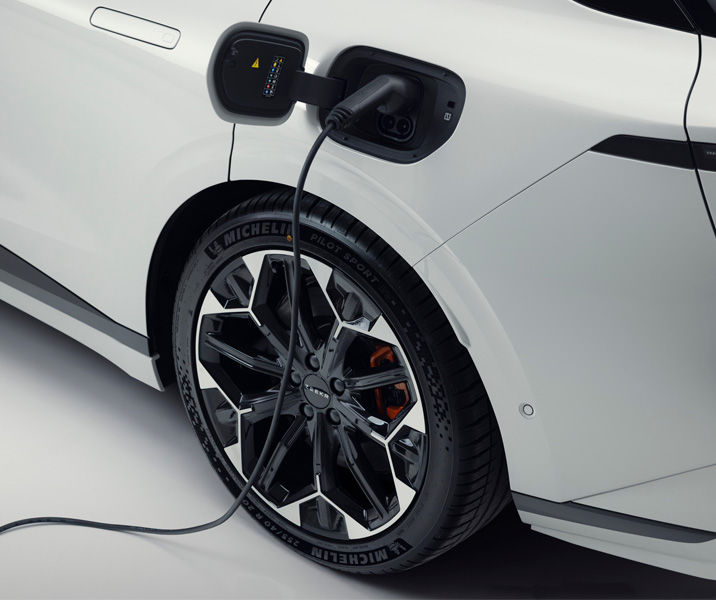 Charger plugged into the side of a Zeekr 7GT sports car